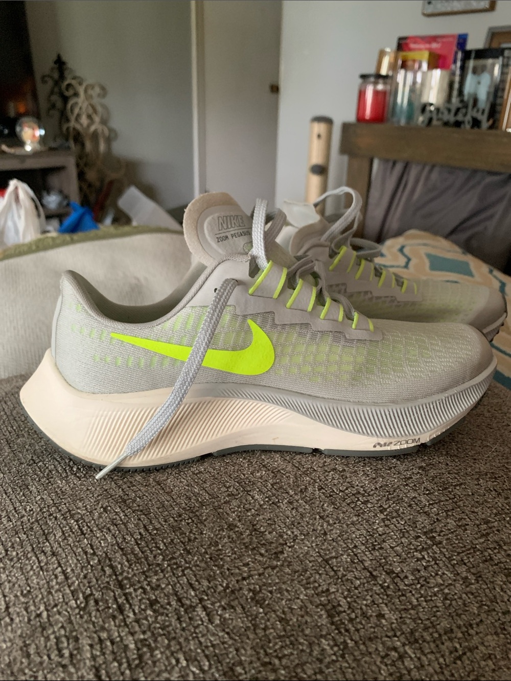 Nike Light Gray Running Shoes with Neon Yellow Swoosh